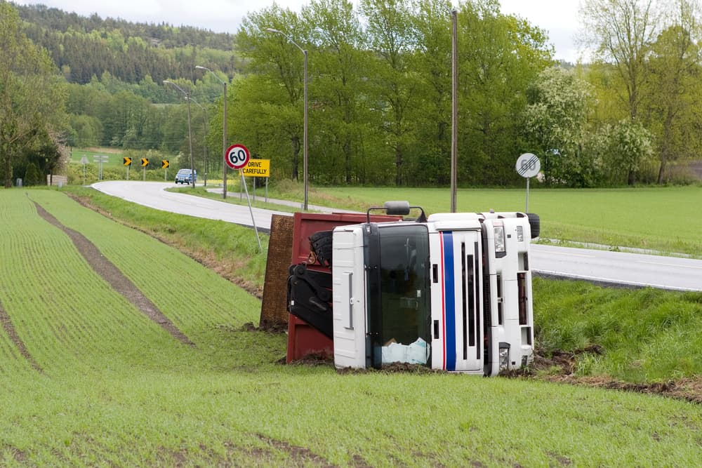 A truck tipped over after an accident.