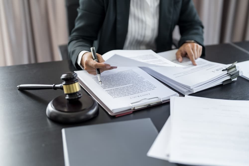 A bicycle accident lawyer discussing a case with an injured cyclist.