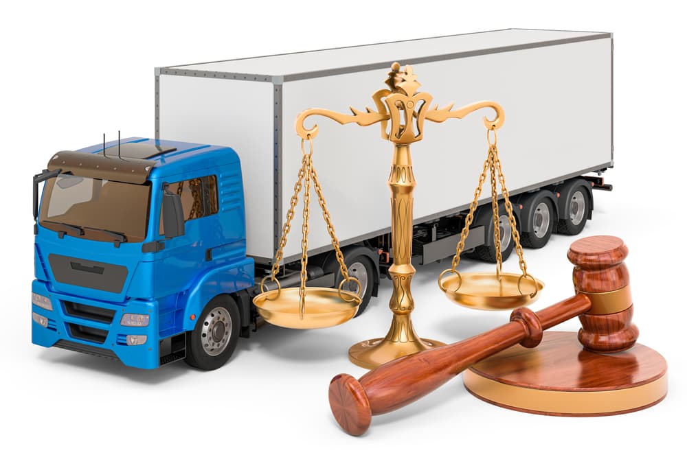 Truck with wooden gavel and scales of justice